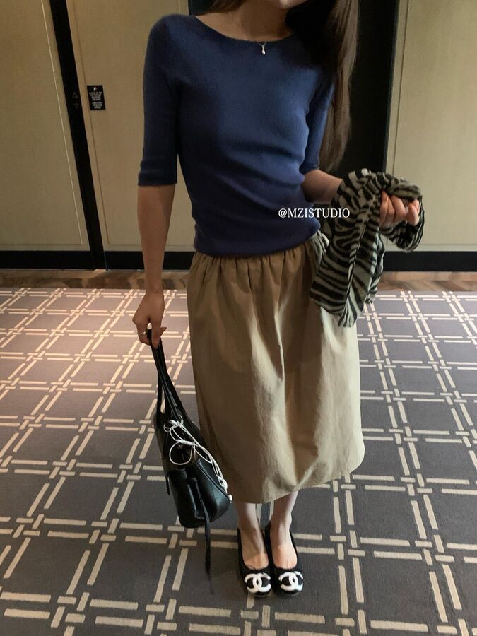 Korean pleated A-line midi skirt in black and khaki