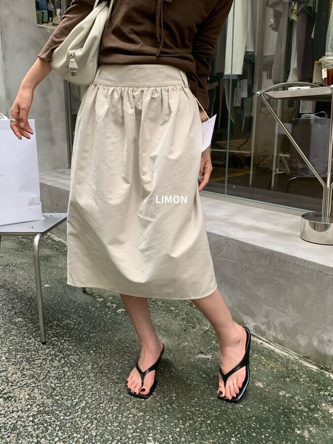 Office elastic waist pleated midi skirt in apricot, coffee, and black