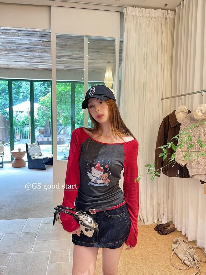 Cartoon print one-shoulder long sleeve t-shirt in apricot, dark grey, light pink, and deep purple